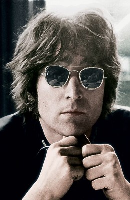 John Lennon with clip on sunglasses 